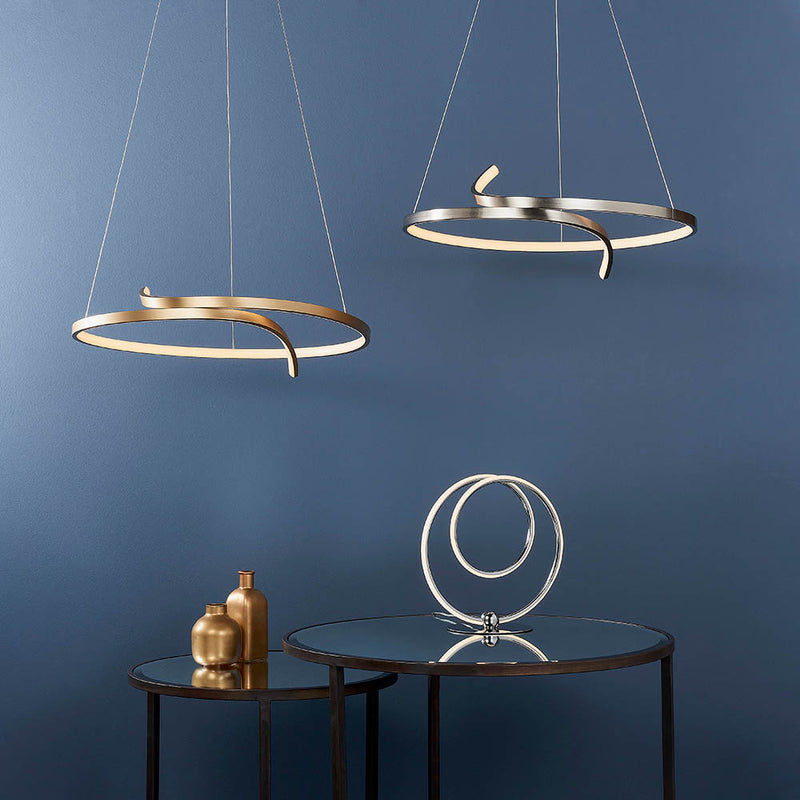 Rafe LED Hoop Pendant lit up in a styled living room
