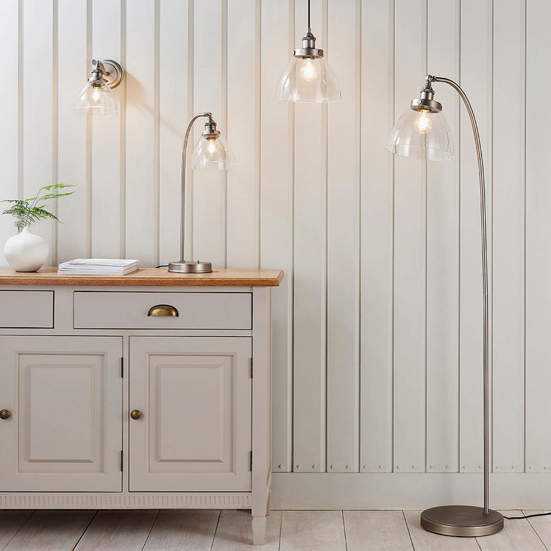 Hansen Floor Lamp lit up in a living room setting
