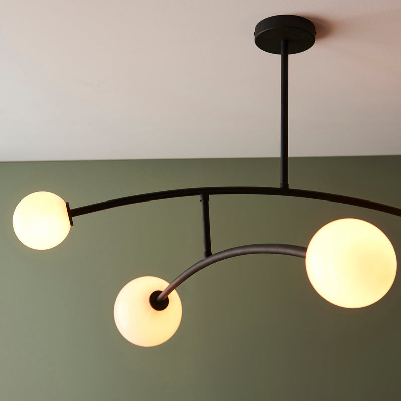 Detail of the matt black and opal glass finish on the Balance 4 Light Semi Flush Ceiling Light