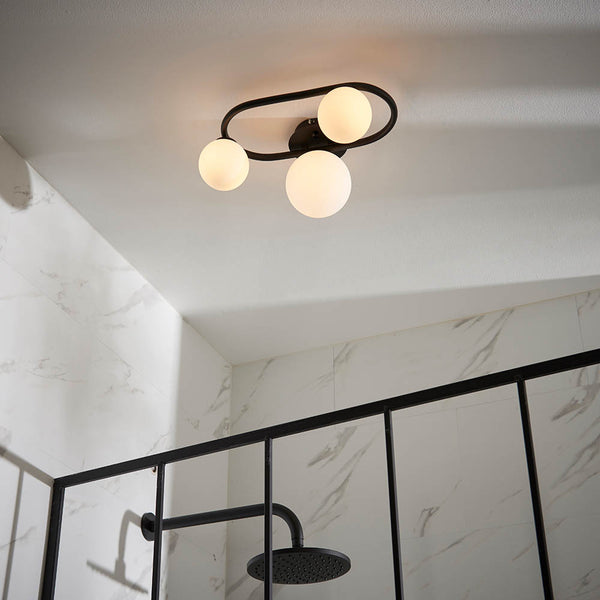 Close-up of the metalwork on the Pulsa 3 Light Bathroom Ceiling Light