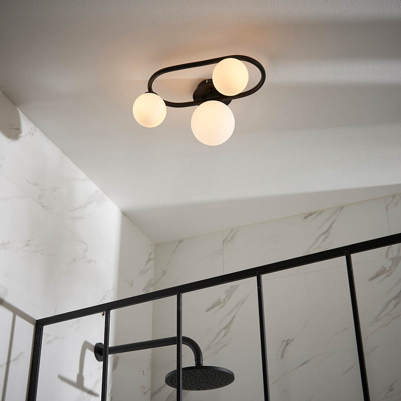 Close-up of the metalwork on the Pulsa 3 Light Bathroom Ceiling Light