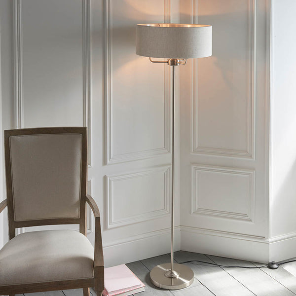 Endon Highclere 3 Light Floor Lamp in brushed chrome and linen in a styled living room