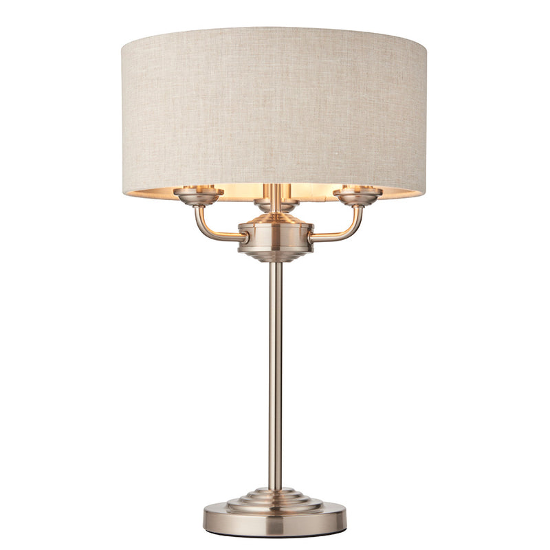Endon Highclere 3 Light Table Lamp in brushed chrome and linen on a white background