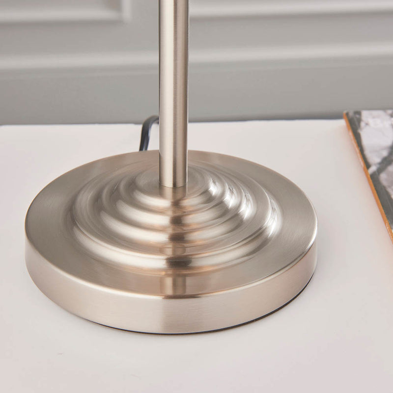 Detail of the brushed chrome and linen finish on the Highclere 3 Light Table Lamp