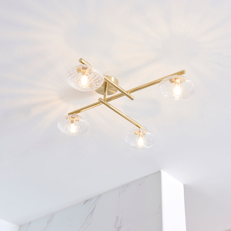 Mobias 4 Light Bathroom Ceiling Light lit up in a styled bathroom