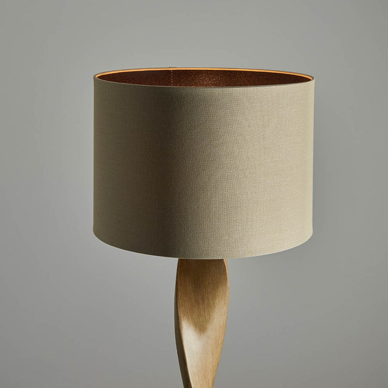 Detail of the oak effect and natural linen finish on the Abia Floor Lamp