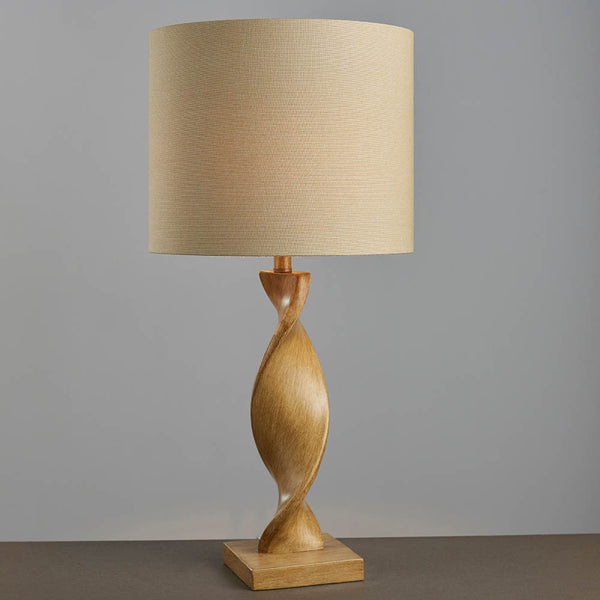Endon Abia Table Lamp in oak effect and natural linen in a styled bedroom