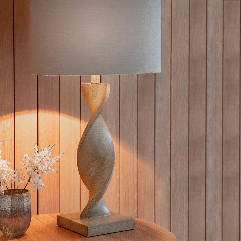 Detail of the oak effect and natural linen finish on the Abia Table Lamp