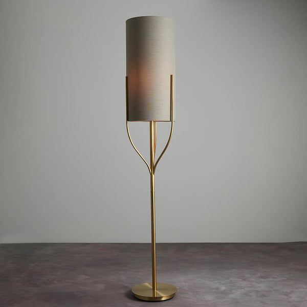 Endon Fraser Floor Lamp in satin brass in a styled living room