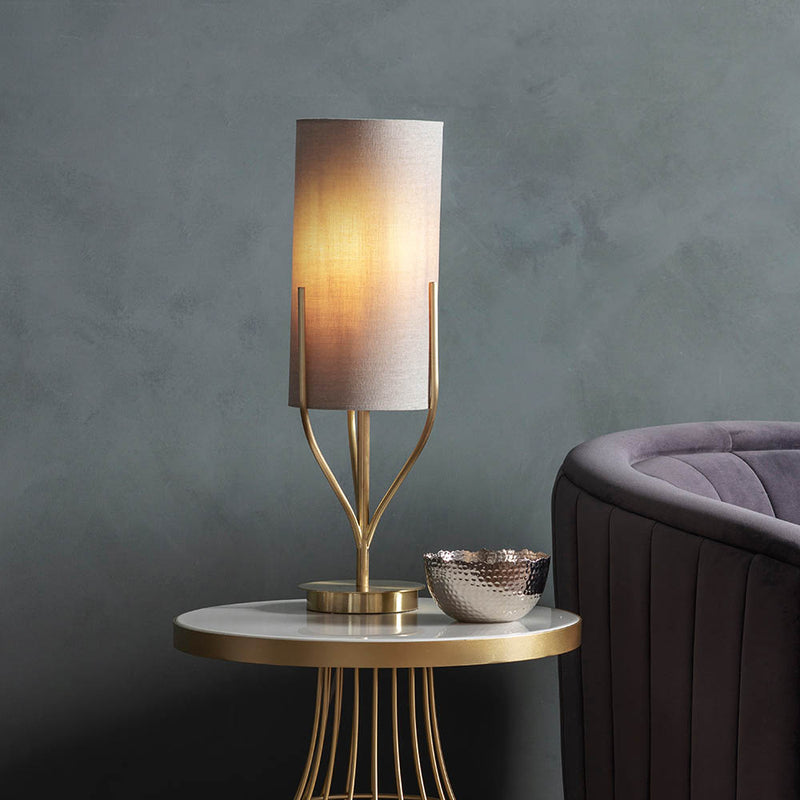 Endon Fraser Table Lamp in satin brass in a styled bedroom