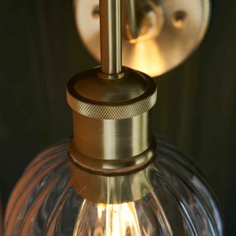 Detail of the satin brass finish on the Kendall Bathroom Wall Light