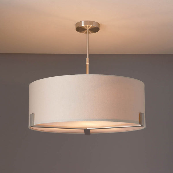 Hayfield 3 Light Drum Pendant in satin nickel and grey hanging in a living room