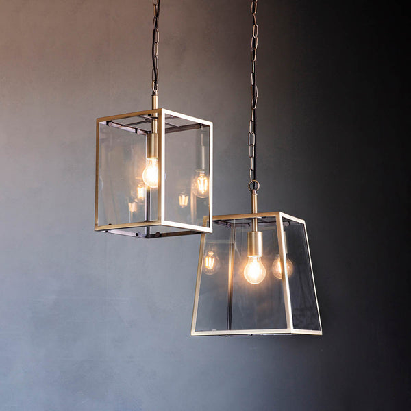 Hurst Lantern Pendant lit up in a styled hallway