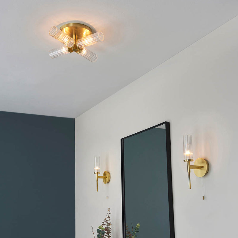 Talo 4 Light Bathroom Ceiling Light in satin brass shown in a room setting
