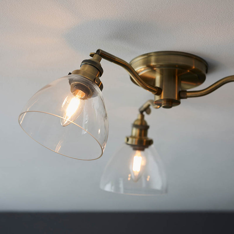 Close-up of the clear glass on the Hansen 3 Light Semi Flush Ceiling Light