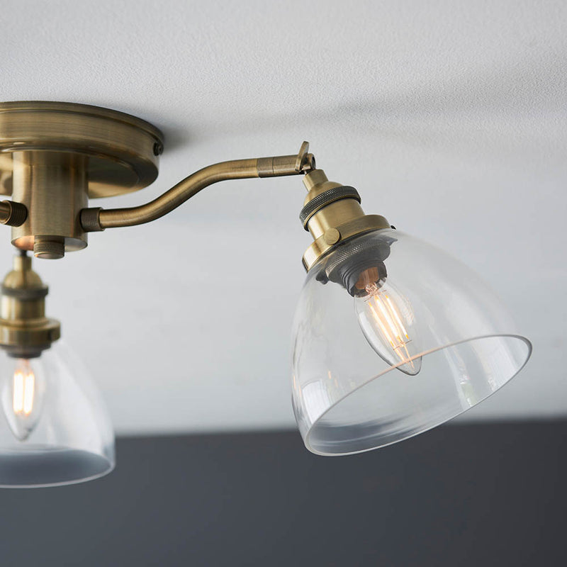 Detail of the antique brass finish on the Hansen 3 Light Semi Flush Ceiling Light