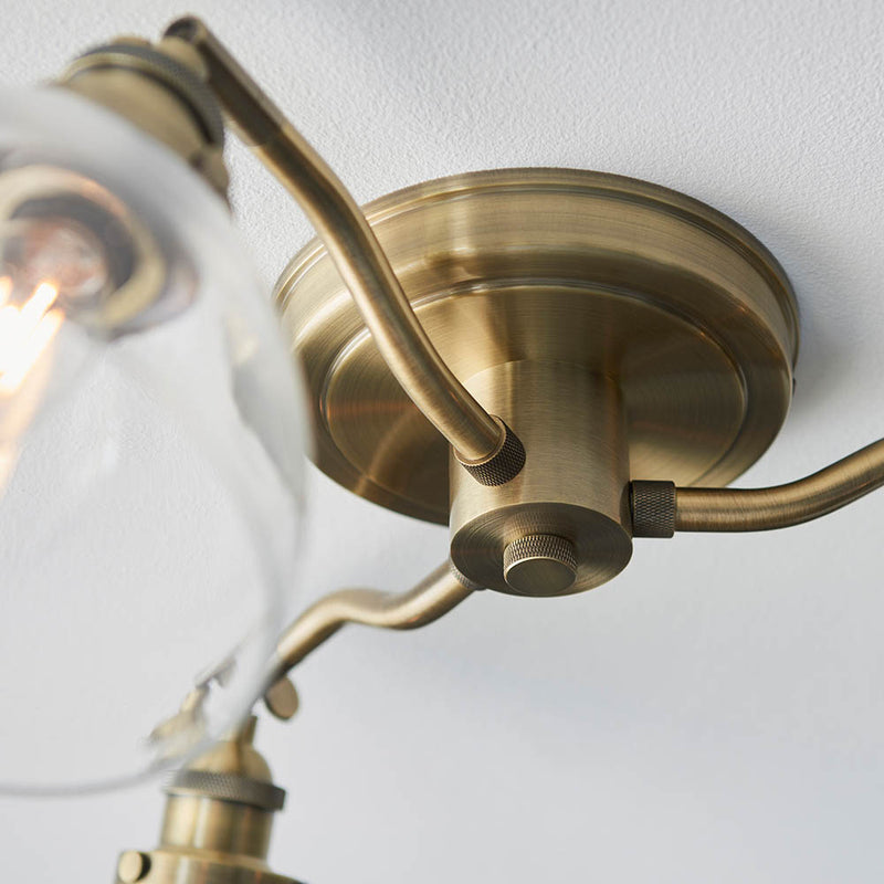 Hansen 3 Light Semi Flush Ceiling Light detail showing the clear glass and fittings