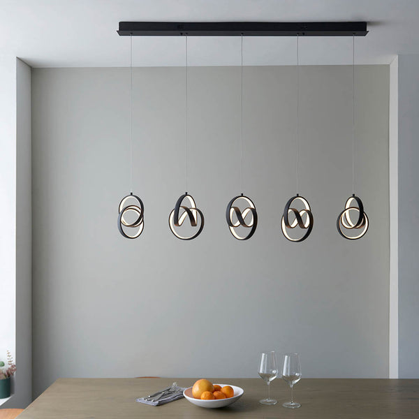 Cosma 5 Light LED Linear Pendant in textured black shown in a room setting