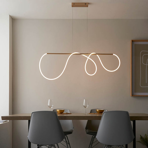 Attalea LED Linear Pendant lit up in a styled dining room