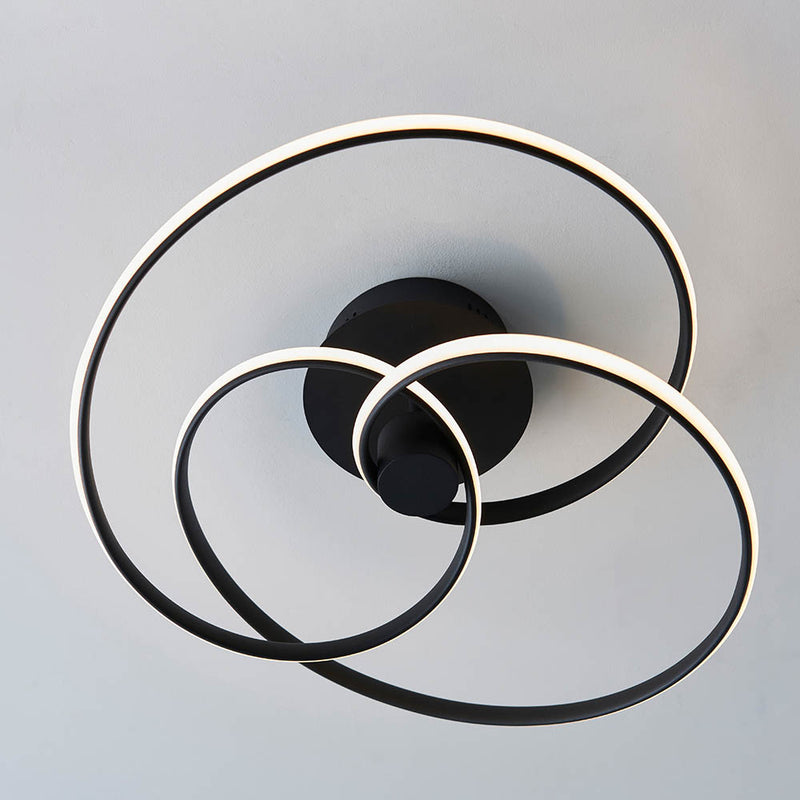 Dune LED Semi Flush Ceiling Light in textured black shown in a room setting