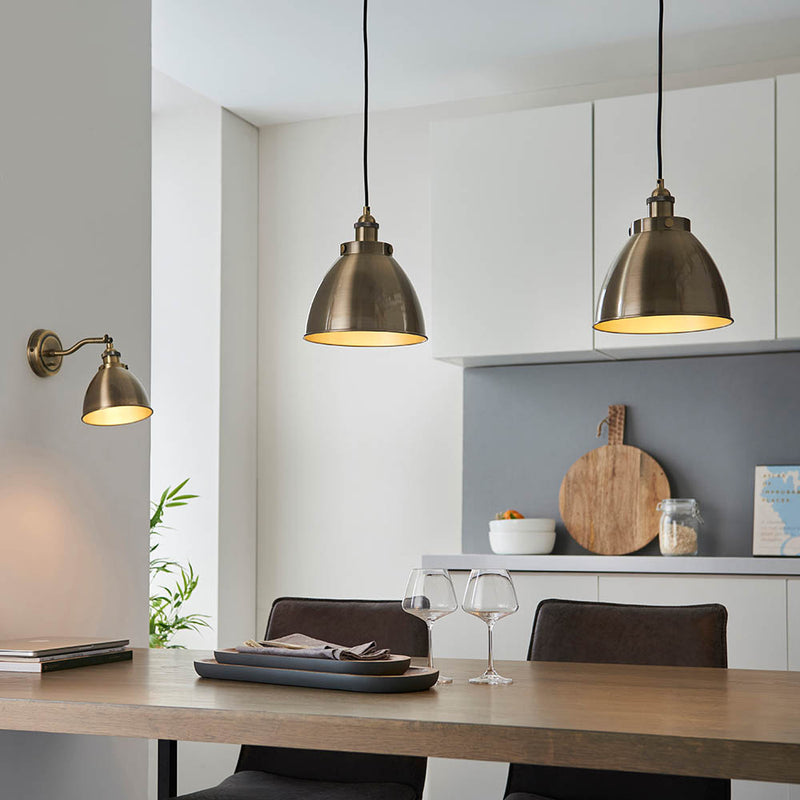 Franklin Small Pendant lit up in a styled kitchen