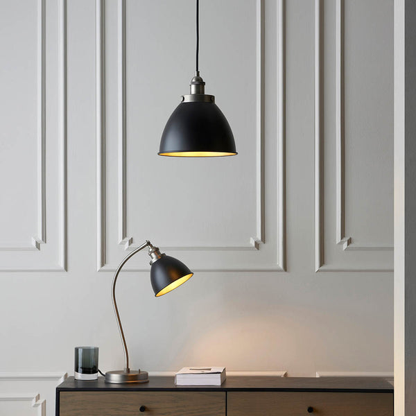 Franklin Small Pendant in matt black and aged pewter shown in a room setting