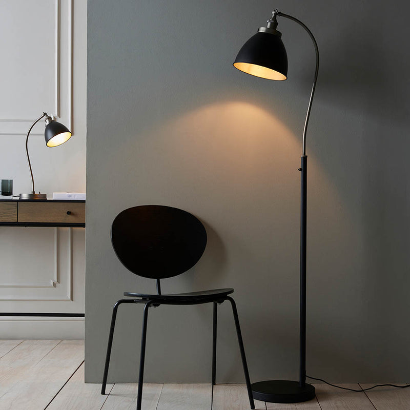 Endon Franklin Task Floor Lamp in matt black and aged pewter in a styled living room