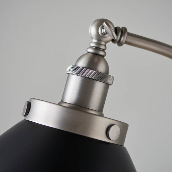 Detail of the matt black and aged pewter finish on the Franklin Task Floor Lamp