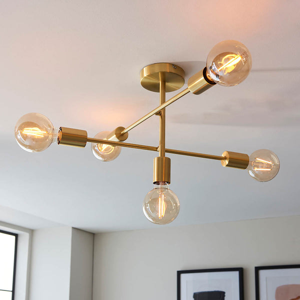 Studio 5 Light Semi Flush Ceiling Light in satin brass on a kitchen ceiling
