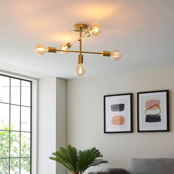 Studio 5 Light Semi Flush Ceiling Light lit up in a styled kitchen
