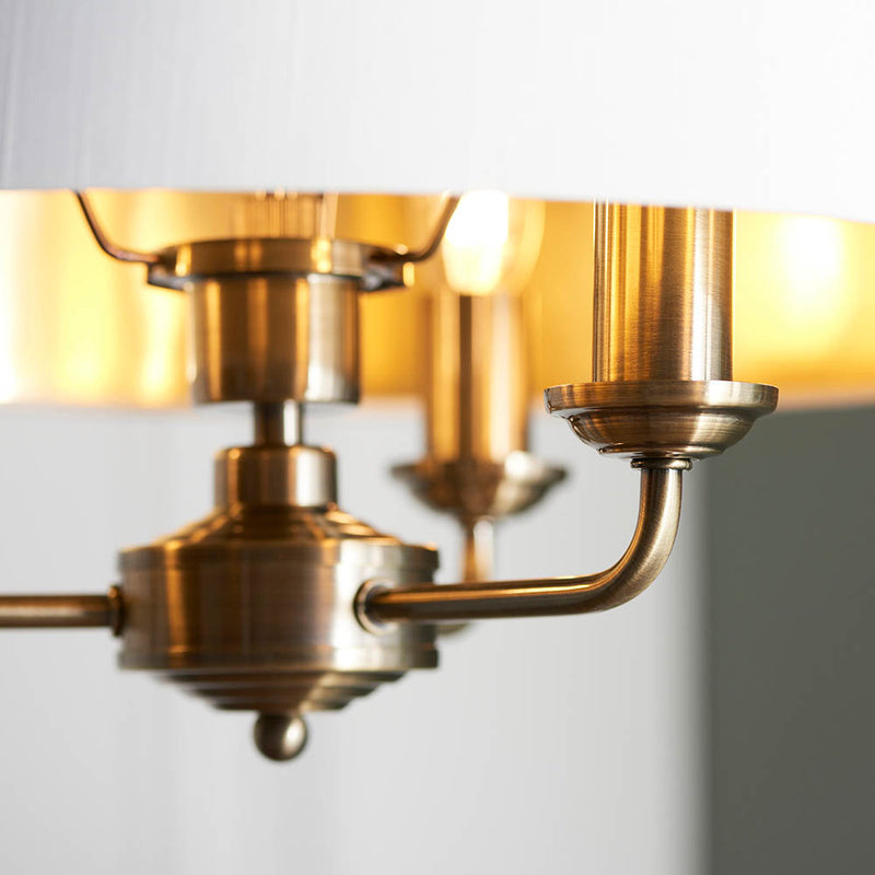 Detail of the antique brass finish on the Highclere 3 Light Drum Pendant