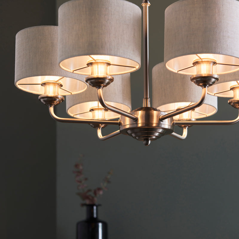 Highclere 6 Light Pendant in brushed chrome shown in a room setting