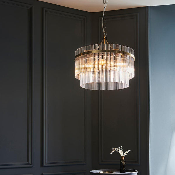 Marietta 5 Light Chandelier lit up in a styled living room
