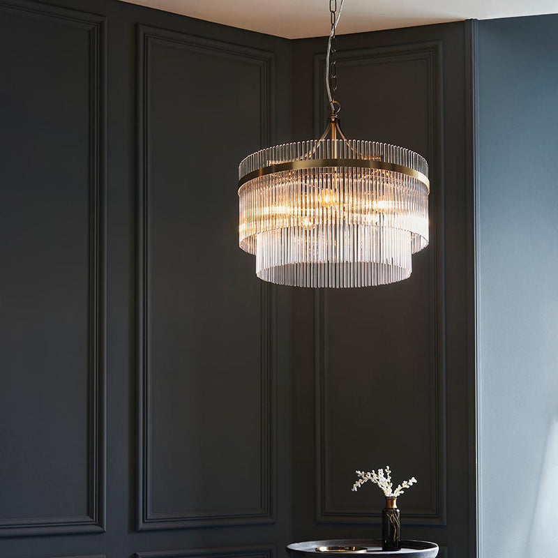 Marietta 5 Light Chandelier lit up in a styled living room
