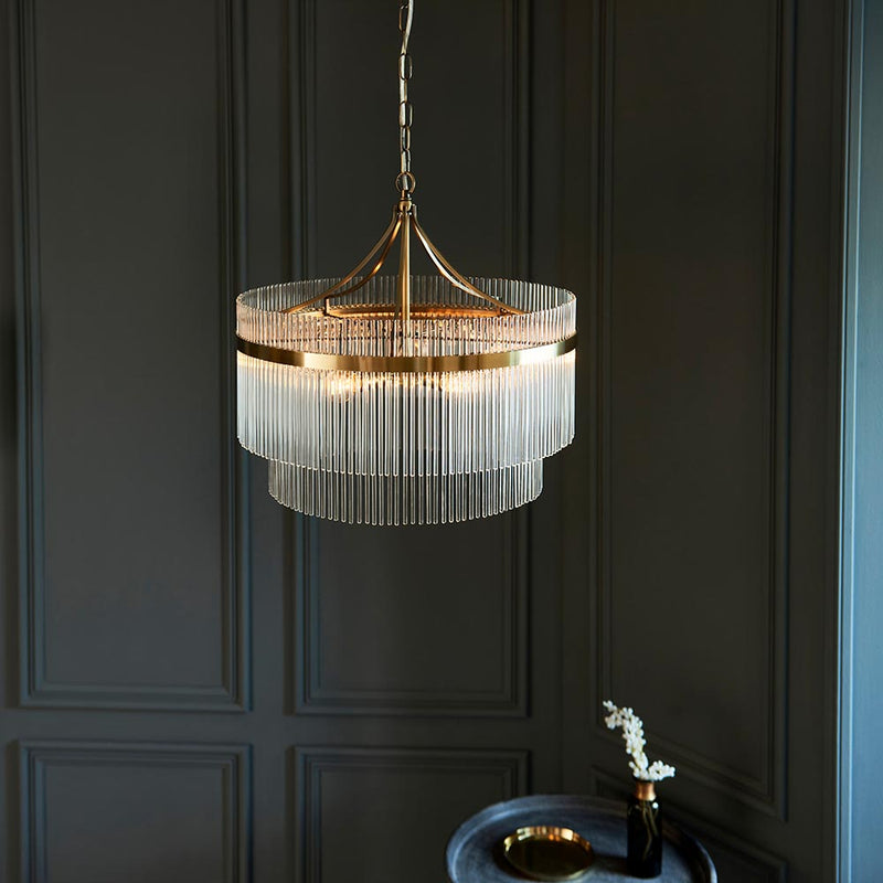 Marietta 5 Light Chandelier in antique brass shown in a room setting