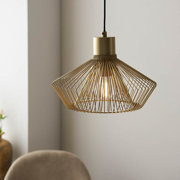 Kimberley Cage Pendant in gold hanging in a kitchen