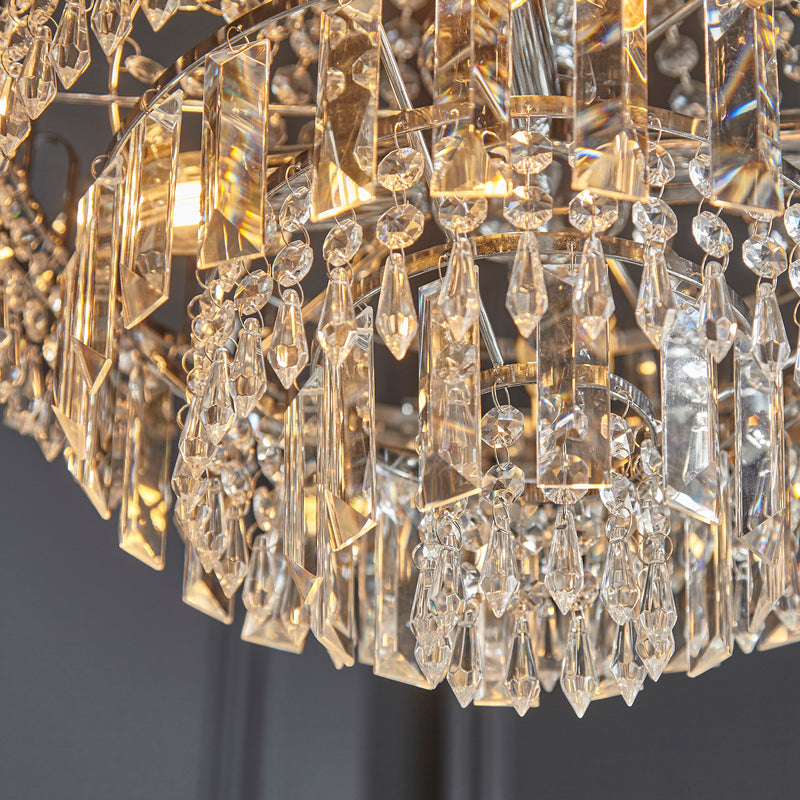 Amadis 6 Light Crystal Pendant chandelier illuminated in warm light