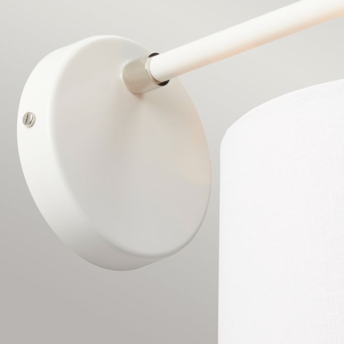 Elstead Balance 1 Light Wall Light in white and polished nickel, featuring a stylish white faux linen shade with silver metallic lining. A modern and elegant lighting solution.