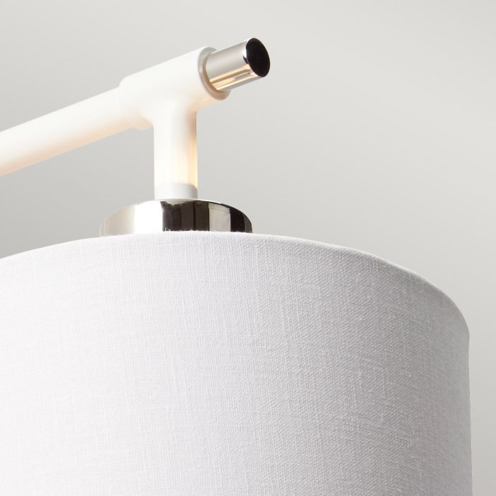 Elstead Balance 1 Light Wall Light in white and polished nickel, featuring a stylish white faux linen shade with silver metallic lining. A modern and elegant lighting solution.