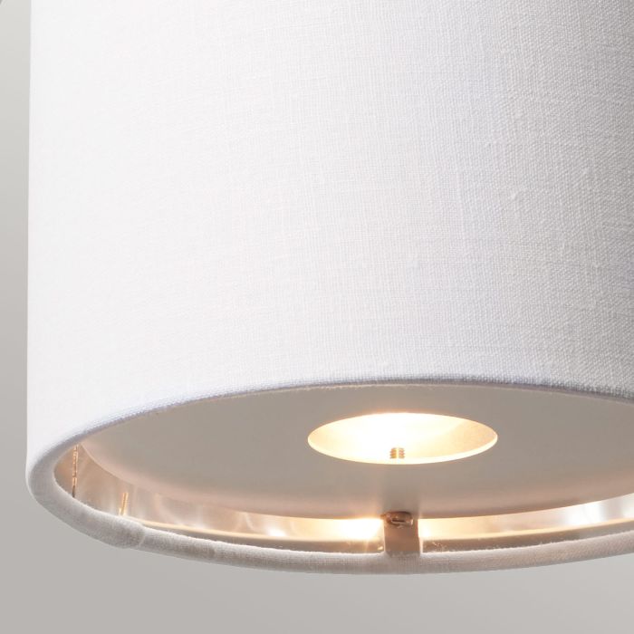 Elstead Balance 1 Light Wall Light in white and polished nickel, featuring a stylish white faux linen shade with silver metallic lining. A modern and elegant lighting solution.