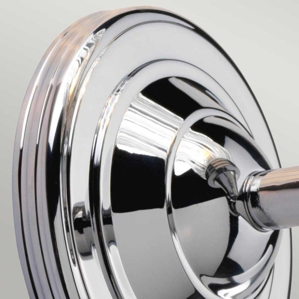 Austen 1 Light Wall Light in polished chrome, IP44-rated for bathroom use. Elegant, solid brass construction with a timeless design.