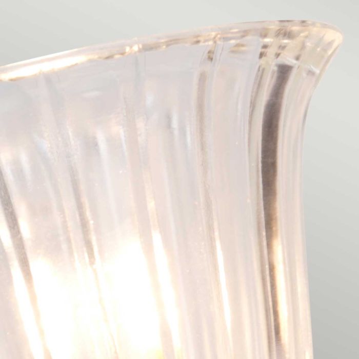 Elstead Carroll 1 Light Wall Light in polished brass with a solid brass body and elegant finish. IP44-rated for bathroom use, includes a 3W LED G9 bulb. Provides warm 3000K illumination with a stylish design.