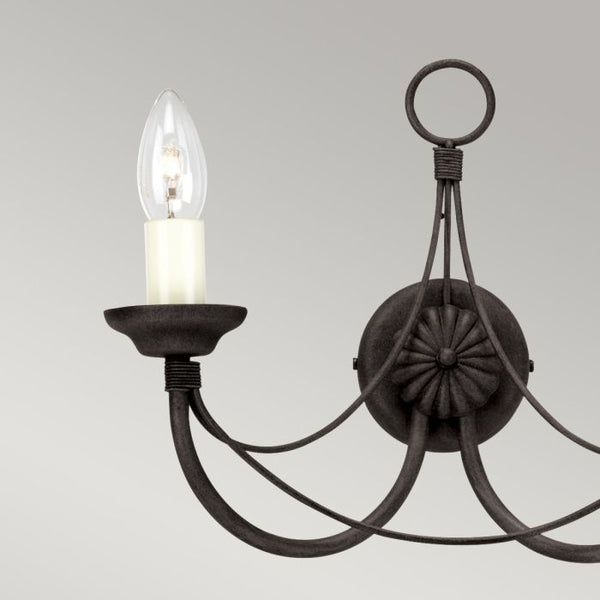 Elstead Carisbrooke 2 Light Wall Light in black with a Gothic candelabra design. Features hand-bound wire drapes and ivory candle tubes. Dimmable and compatible with E14 bulbs.