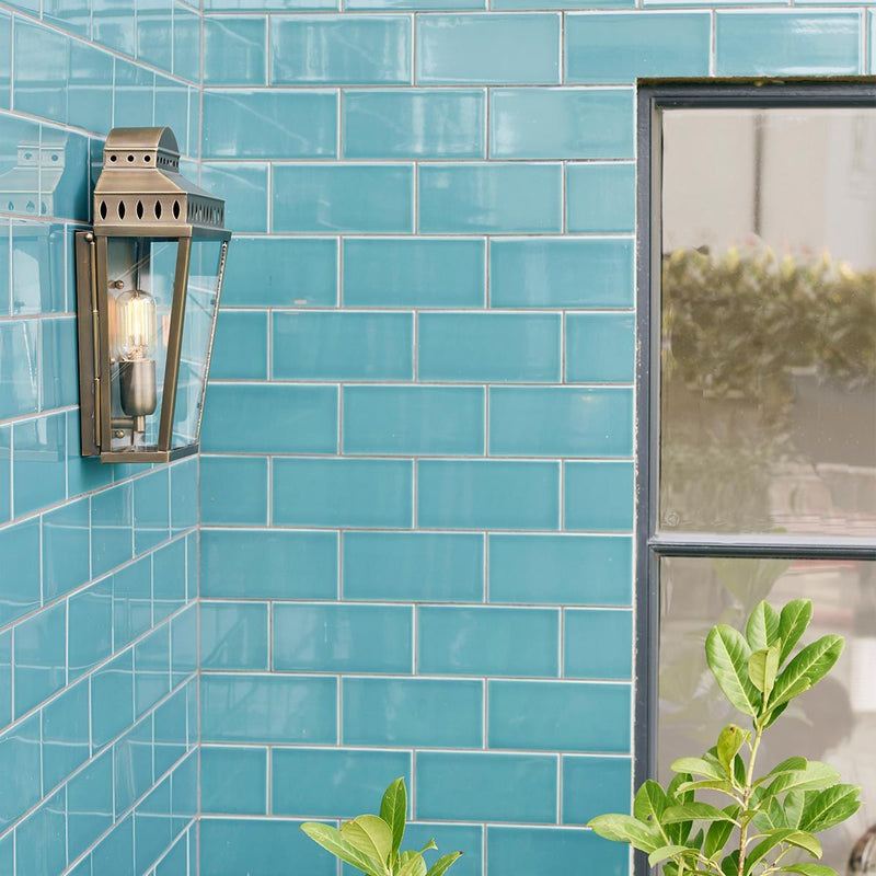 Aged brass Mansion House 1 Light Wall Lantern featuring a classic pre-Georgian British design with clear glass panels. Handcrafted for durability and finished with a lacquered aged brass coating, ideal for elegant outdoor spaces.