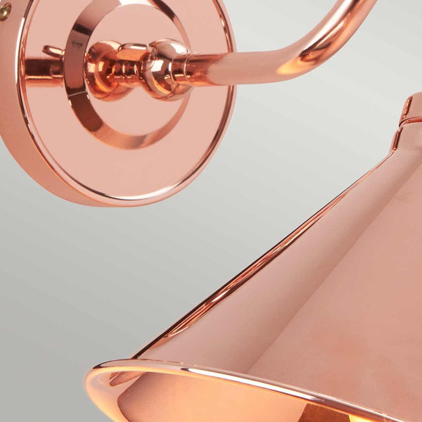 Elstead Provence 1 Light Wall Light in polished copper, inspired by mid-1900s French designs. Features an adjustable knuckle for directional lighting, vintage aesthetics, and a durable mild steel build.