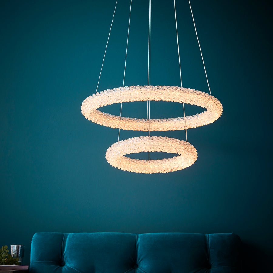 Endon lighting 2 ring 1 light unique chrome plated, double hoop pendant, inspired by the pattern of quickly formed ice crystals. Over 5,000 faceted crystals form this chandelier. Suspended from delicate, height adjustable clear wire cables. Position over dining tables, in bedrooms or as a centre piece in living rooms for an amazing complement to your interior.