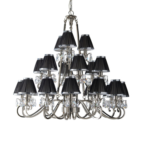 This Oskana 21 light candle chandelier with crystal droplets is from our Oksana nickel range by Interiors 1900. The Oskana Nickel 21-light pendant is an impressive candle chandelier fitting. Finished in a polished nickel plate so it's a perfect piece for hallways, living rooms, and dining rooms.