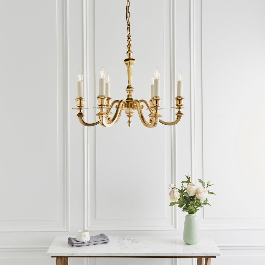 The Fenbridge 6 light pendant by our Interiors 1900 range is a classic candelabra design, made from solid brass with gloss cream candle drips. This fitting is dimmable and is compatible with LED bulbs. Matching items are available.