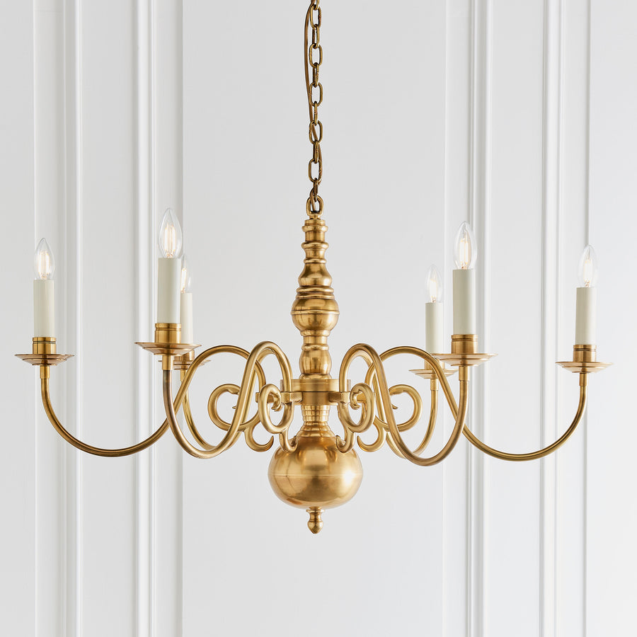 The Chamberlain 6 light pendant is a classic, solid brass candle chandelier with a soft, mellow brass finish and beautifully curved detailing. Made to the highest quality using traditional casting techniques and then hand finished with cream candle drips to complete the look it comes with marble silk shades.  This Chamberlain 6 light is dimmable and suitable for use with LED bulbs. Supplied complete with fixing accessories.