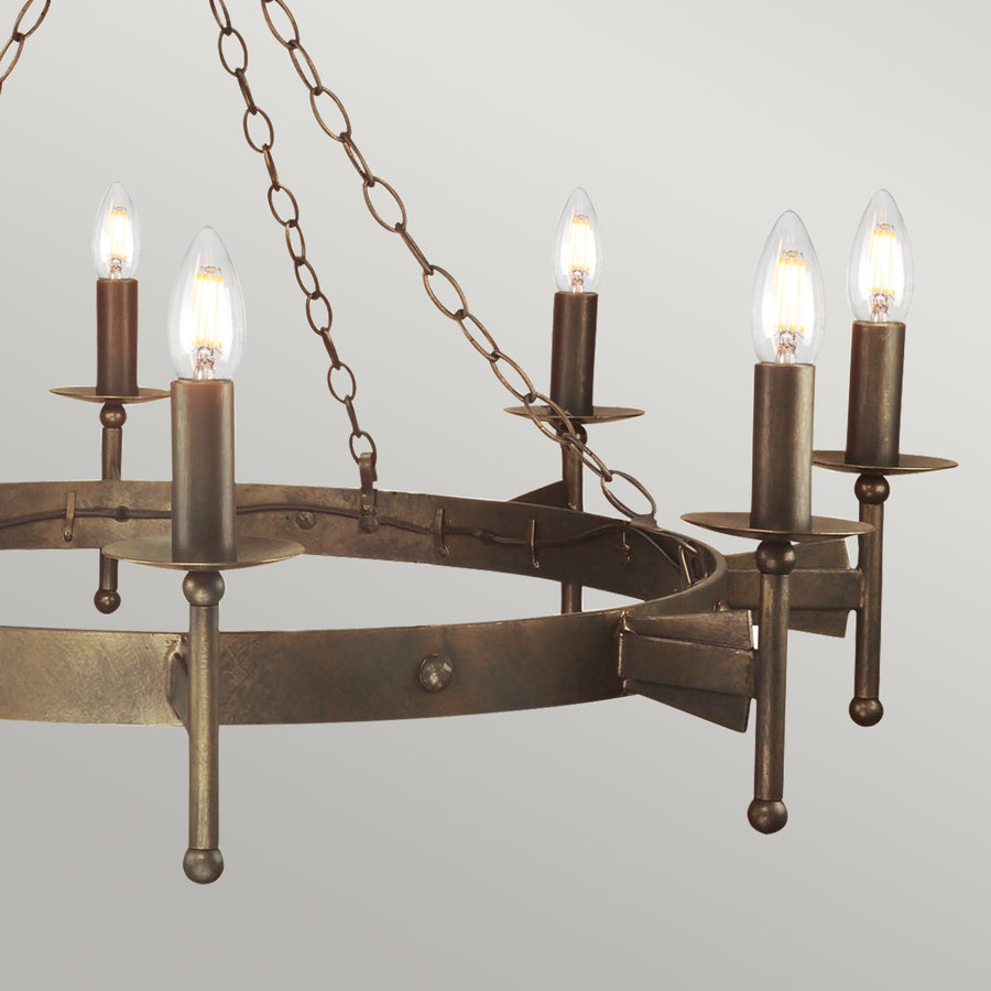 The Elstead Cromwell aged bronze cartwheel 8 light large Gothic chandelier, hand finished in a unique aged bronze finish, with matching candle tubes and metal sconces.The Elstead Cromwell aged bronze cartwheel 8 light large Gothic chandelier, hand finished in a unique aged bronze finish, with matching candle tubes and metal sconces.